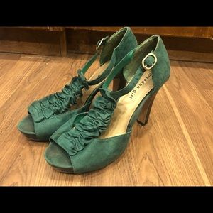 Green high heel shoes